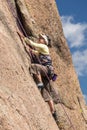 Senior lady on steep rock climb in Colorado Royalty Free Stock Photo