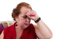 Senior lady suffering from a headache