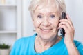 Senior lady talking on cellular phone Royalty Free Stock Photo