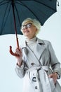 senior lady in trench coat Royalty Free Stock Photo