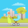 Senior Lady with Trolley Pram Walking in City Park Royalty Free Stock Photo