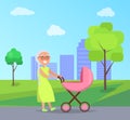 Senior Lady with Trolley Pram Walking in City Park Royalty Free Stock Photo