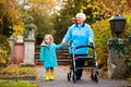 Senior lady with walker enjoying family visit Royalty Free Stock Photo