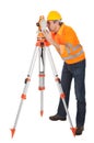 Senior land surveyor with theodolite