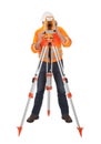 Senior land surveyor with theodolite