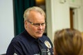 Senior Lead Officer Sellers speaks to residents at a neighborhood watch LAPD basic car meeting at Granada Hills High School