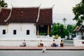 Senior local people waiting for luang prabang morning alms tradition