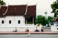 Senior local people waiting for luang prabang morning alms tradition