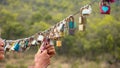 Senior look at colorful locks hang on cable with blurry nature background. love and safety life new normal concept