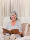 Senior looking at her photo album