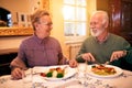 Senior lovely couple eating healthy lunch at nursing home Royalty Free Stock Photo