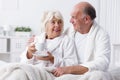 Senior lovers in bed Royalty Free Stock Photo