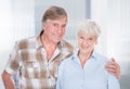 Senior loving couple looking at camera Royalty Free Stock Photo