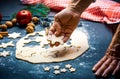 Senior making a festive decorated pastry at home