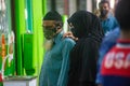 Senior maldivian couple in masks at the street during corona virus pandemic