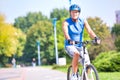 Senior male athlete riding bicycle in park Royalty Free Stock Photo