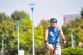 Senior male athlete riding bicycle in park Royalty Free Stock Photo