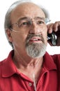 Senior male with breathing disability talking on the phone