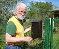 Senior male checking email box