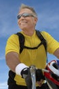 Senior Male Cyclist Riding Bicycle Royalty Free Stock Photo