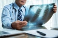 Senior Male doctor looking to x-ray film. Royalty Free Stock Photo