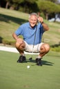 Senior Male Golfer On Golf Course Royalty Free Stock Photo