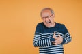 Senior male having chest pain his suffer from cardiac heart attack. Old elderly man patient has difficulty breath his chest. Royalty Free Stock Photo