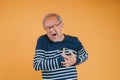 Senior male having chest pain his suffer from cardiac heart attack. Old elderly man patient has difficulty breath his chest. Royalty Free Stock Photo