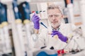 Senior male life scientist researching in the laboratory.