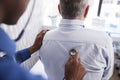 Senior Male Patient Having Medical Exam With Doctor In Office Royalty Free Stock Photo