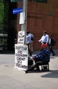 A senior male person protests at Martin Place, Sydney