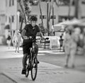 Senior Male riding bike on boardwalk in Hollywood Beach, Florida.