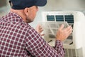 senior man assembling air conditioning unit Royalty Free Stock Photo