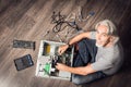 Senior Man Assembling A Desktop Computer