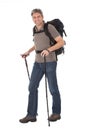 Senior man with backpack and hiking poles Royalty Free Stock Photo