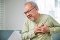 Senior man bad pain hand touching chest having heart attack Royalty Free Stock Photo