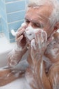 Senior man bathing Royalty Free Stock Photo