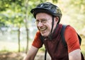 Senior man biking in the park Royalty Free Stock Photo