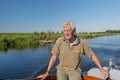 Senior man in boat on river Royalty Free Stock Photo