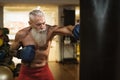 Senior man boxing in sport gym center club Royalty Free Stock Photo