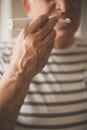 Senior man brushing teeth. Royalty Free Stock Photo