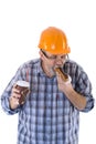 A senior man builder has a lunch with coffee and cake Royalty Free Stock Photo