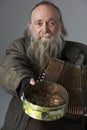 Senior Man Busking With Accordian Royalty Free Stock Photo