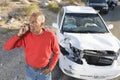 Senior Man On Call With Damaged Car In The Background Royalty Free Stock Photo