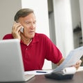 Senior man checking home finances Royalty Free Stock Photo