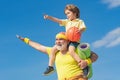 Senior man and child in family health club. Doing sports is free. Grandpa and grandson spotting. Grandfather and child Royalty Free Stock Photo