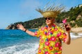 Senior man with cocktail drink at the beach Royalty Free Stock Photo