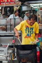 Senior man cooks noodles at the Kimberly Street Market, Penang Royalty Free Stock Photo