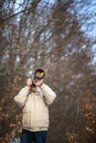 Senior man devoting time to his favorite hobby - photography