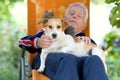 Senior man with dog and cat Royalty Free Stock Photo